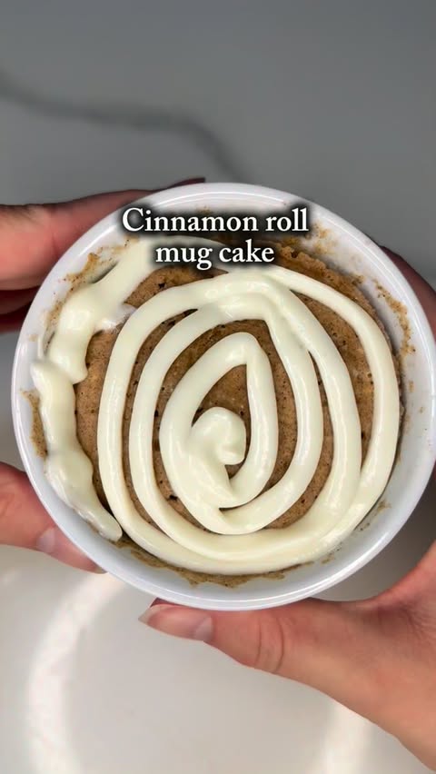 Instagram post by @amelia.the.foodie for fairlife. Caption reads: Cinnamon roll mug cake! Ingredients: * 4 tbsp....