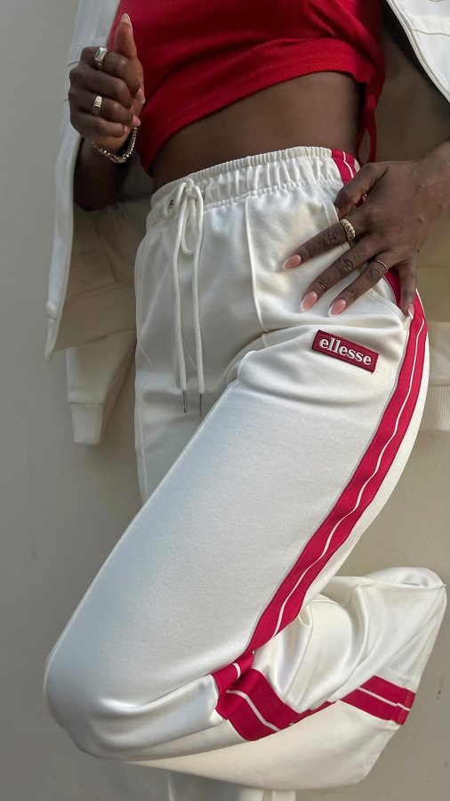 Instagram post by @pamzokuhle for ellesse. Caption reads: Fit Check 🍒.