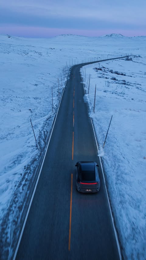 Instagram post by @bokehm0n for Tesla. Caption reads: Six days in Norway: mountains, silence… and a....