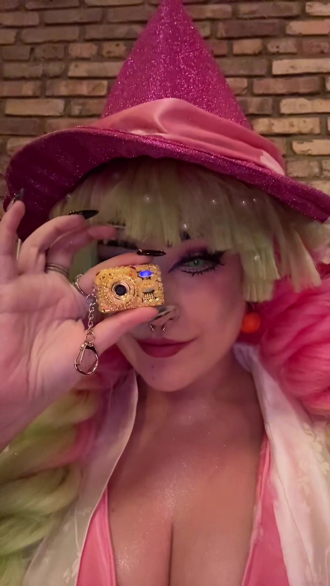 TikTok post by @sasukes.side.piece for Fitpolo. Caption reads: Bringing my @HOTU US mini camera to a Halloween....