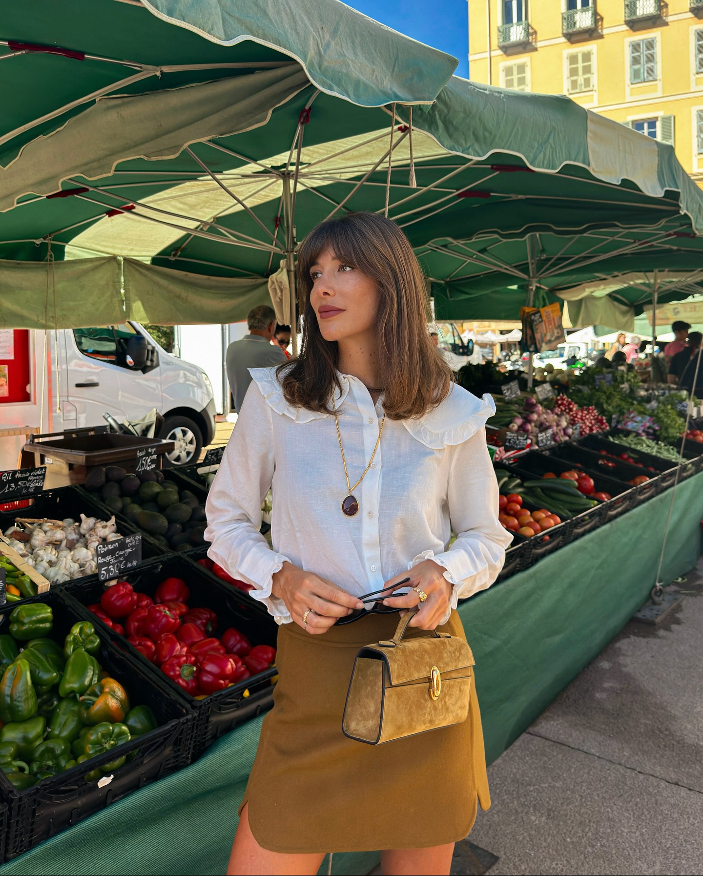 Instagram post by @juliesfi for Sezane. Caption reads: Wearing my favorite outfit at the market >
@sezane....