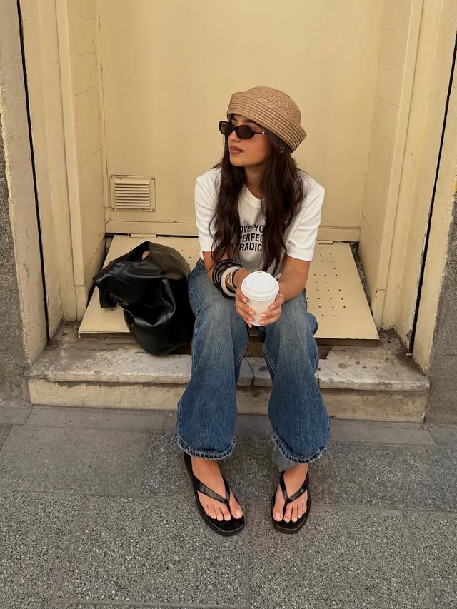 Instagram post by @bianca.barese for Stradivarius. Caption reads: in my raffia bucket hat era :) @stradivarius....