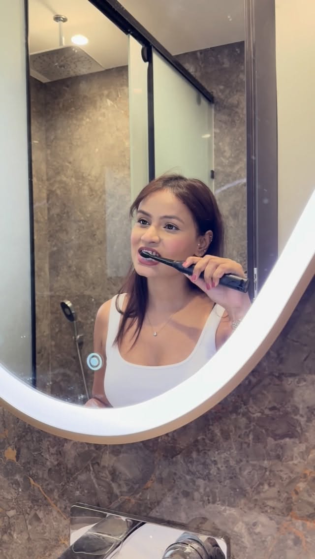 Instagram post by @ankitaarya987 for AGARO Lifestyle. Caption reads: Because your smile deserves the best 🦷Switch to....