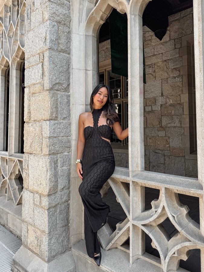 Instagram post by @swagnes_ for 12th Tribe. Caption reads: This jumpsuit from @shop12thtribe 🖤😮‍💨....