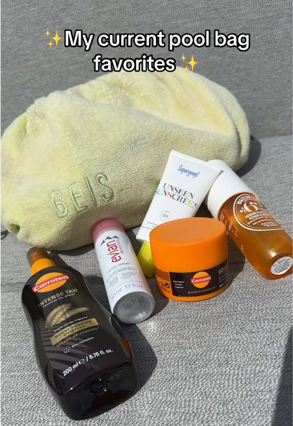 TikTok post by @emelinax3 for Evian Facial Spray USA. Caption reads: A glimpse in my ✨ pool bag ✨ Loving all of these....