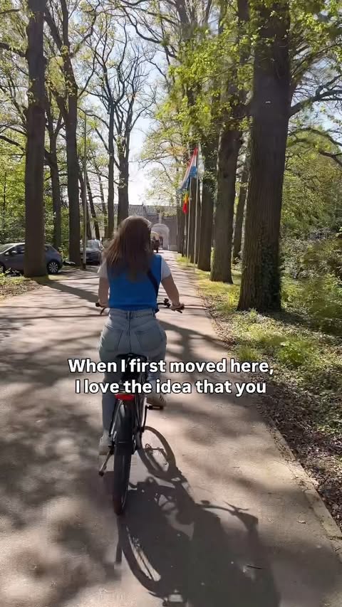 Instagram post by @midwesternermeetworld for TENWAYS E-Bike. Caption reads: A perfect weekend activity in NL ❤️ We took our....