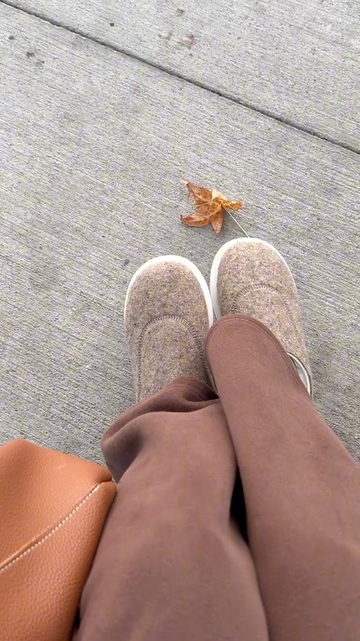 Instagram post by @herafery.gasimova for Allbirds. Caption reads: Stepping into the day with my kiwi clogs🤞🏼 Thank....