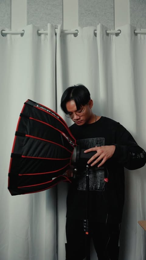 Instagram post by @enerico.jr for iFootage. Caption reads: [...] small home studio Lights used are from....