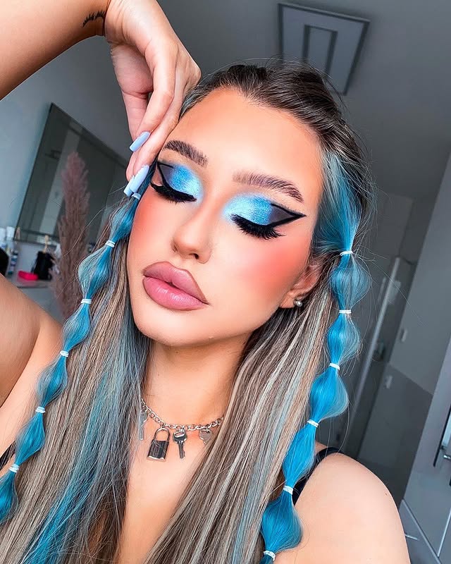 Instagram post by @gloschi for BH Cosmetics. Caption reads: [...] the next voting🥺💙 Makeup Details:....