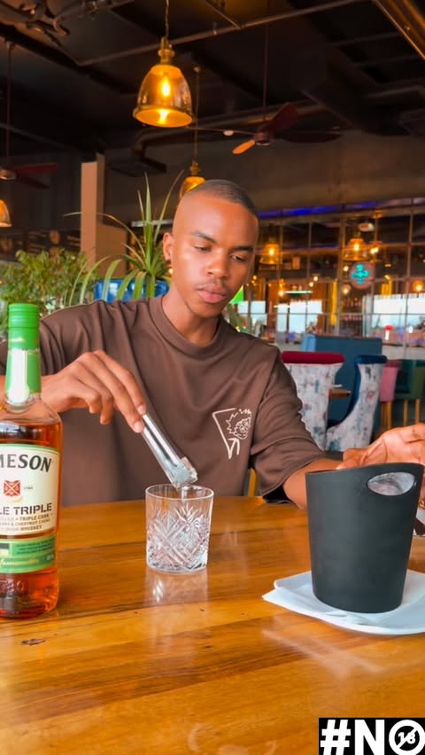 Instagram post by @malome_james for Jameson Irish Whiskey. Caption reads: Saturday vibes in my city 🏙️ From fresh hair cuts....