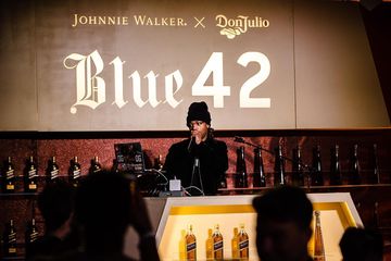 Instagram post by @metroboomin for Johnnie Walker US. Caption reads: #ad celebrated Big Game Weekend by performing at....
