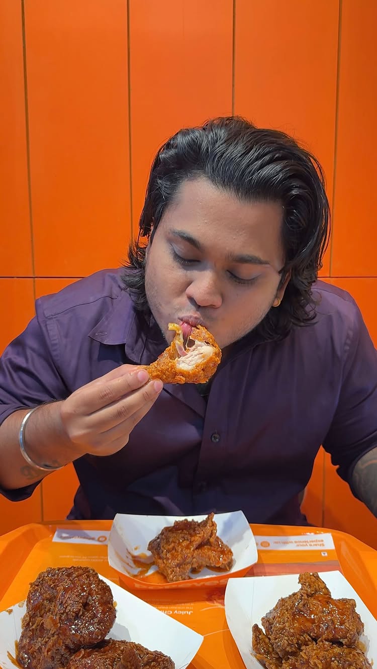 Instagram post by @foodaholic_deepak for Popeyes. Caption reads: Thrissur foodies, the wait is over! 🍗✨....