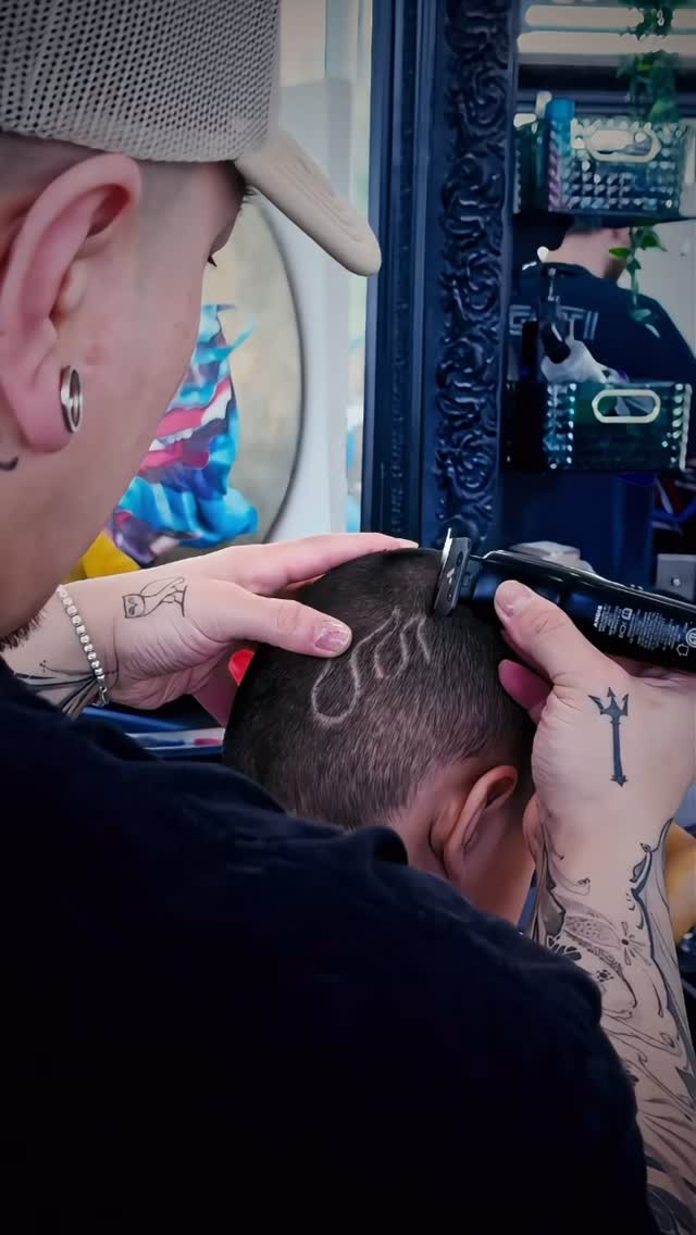 Instagram post by @famos for Andis Pets. Caption reads: Redefining a fire cut. 🔥.