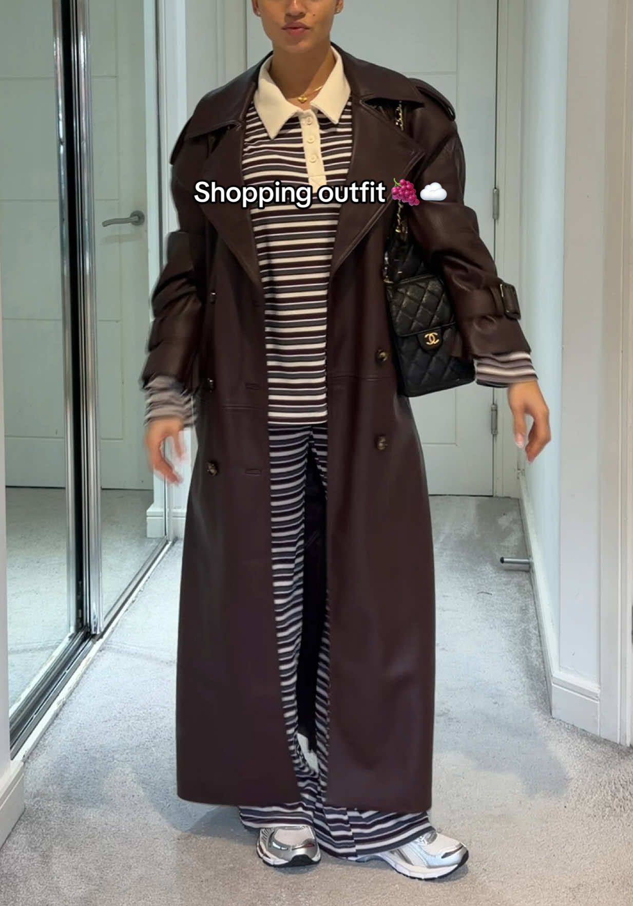 TikTok post by @tyrabaylis for ASOS. Caption reads: [...] the stripes are cuteeee🍇✨ The coat is....