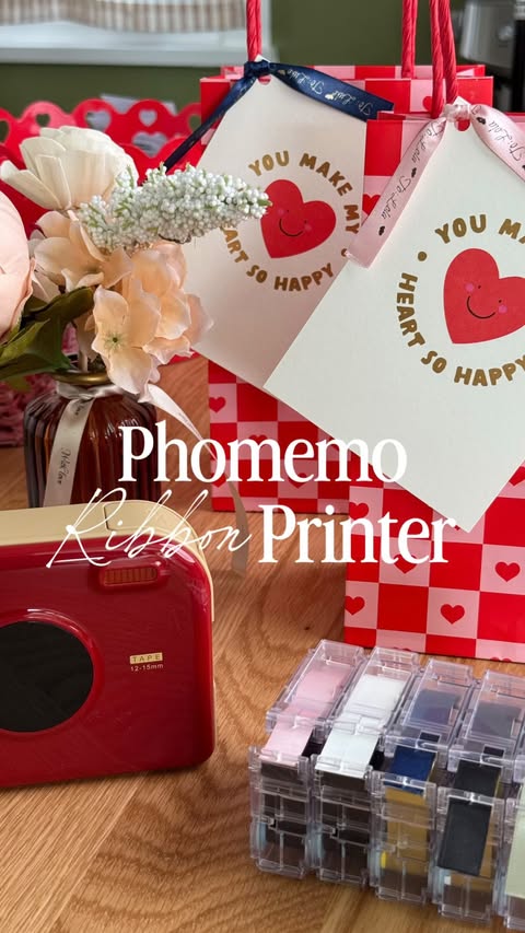 Instagram post by @theholidayclassics for Phomemo. Caption reads: The Phomemo Ribbon Printer is the perfect [...].