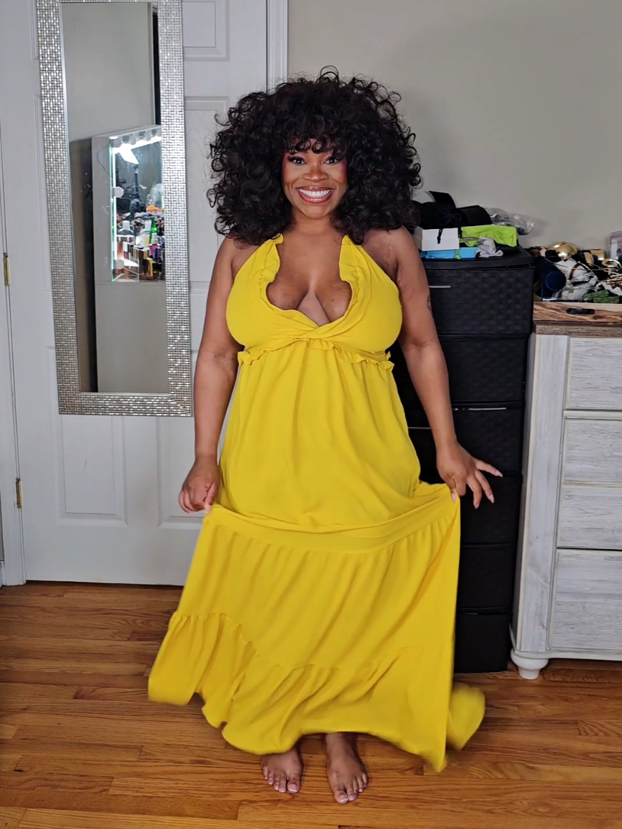 TikTok post by @brittbratstyles for JLUXLABEL. Caption reads: SPRING 🌼🌼🌼 #spring #maxidress #sundress....