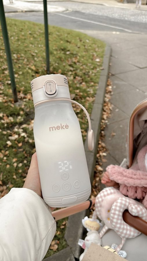 Instagram post by @harperandevelyn_x for Meke Baby. Caption reads: Out and about using the @mekebaby.au milk warmer....