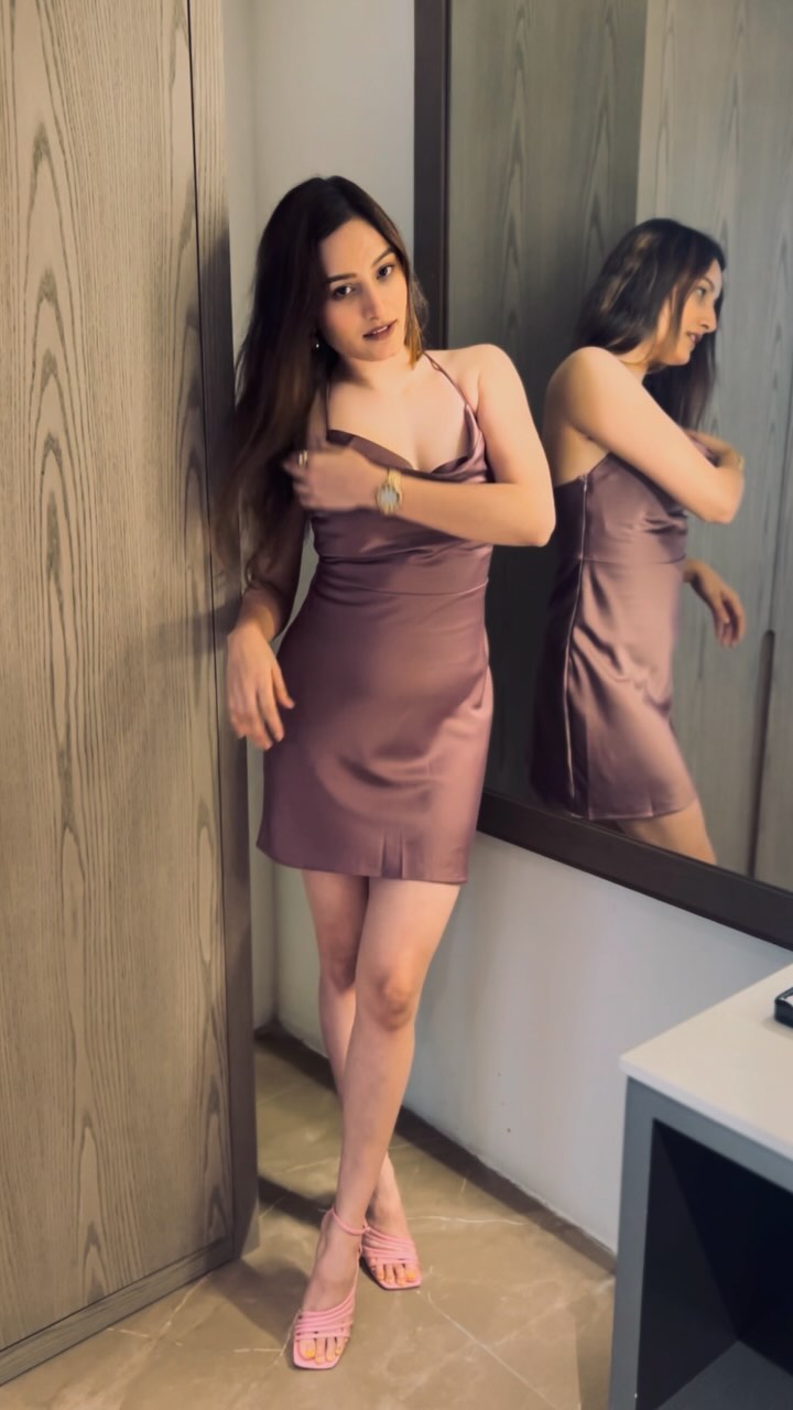 Instagram post by @a1rabic for AURA. Caption reads: this gorgeous satin peach dress from @aura.slg 🍑....