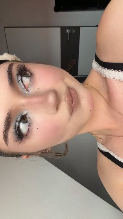 Instagram post by @australialix for OLENS official (EN). Caption reads: Blue eyes go so well with blue makeup 🌊 Using....