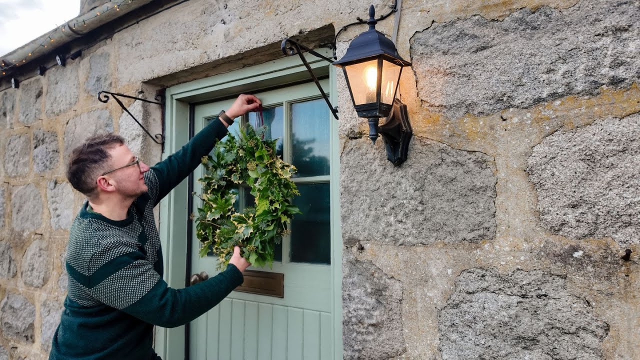 YouTube post by @rewildingjude for The Kitchn. Caption reads: Christmas, Alone in the Countryside.