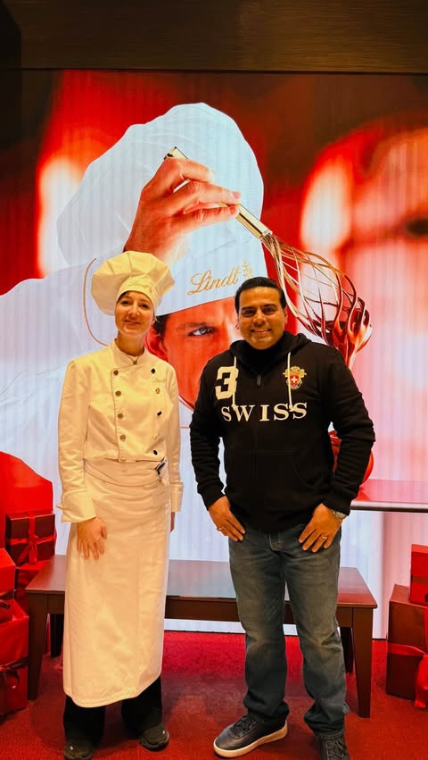 Instagram post by @xtravagant_xquisite_xplorer for Lindt. Caption reads: [...] Simply Swiss, simply bliss. 🍫✨🇨🇭🎄....