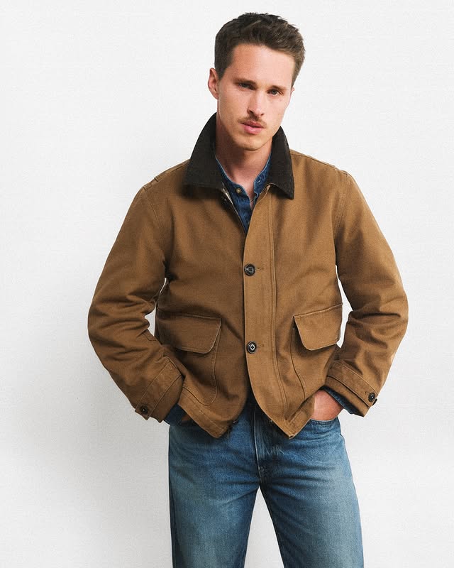 Instagram post by @ryanbeatty for J.Crew. Caption reads: beatty in a barn jacket @jcrew #jcrewpartner.