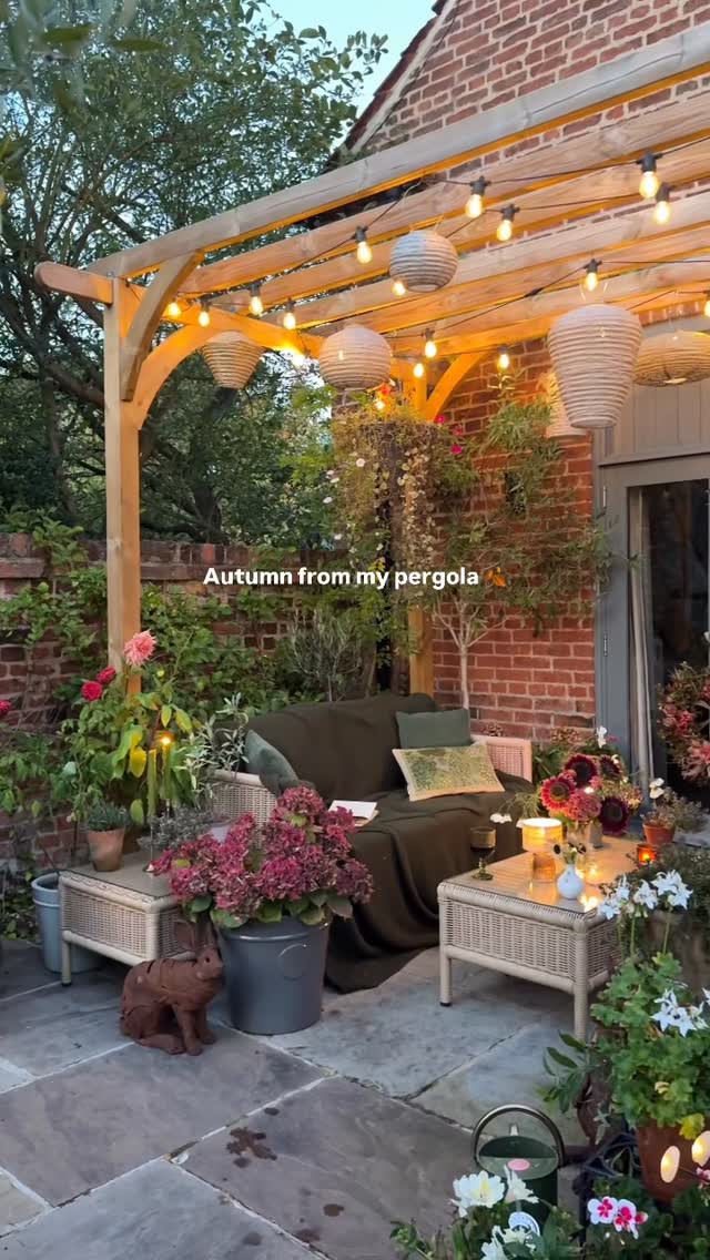 Instagram post by @bydesignermum for Wickes. Caption reads: Welcome to my favourite corner… where the garden....