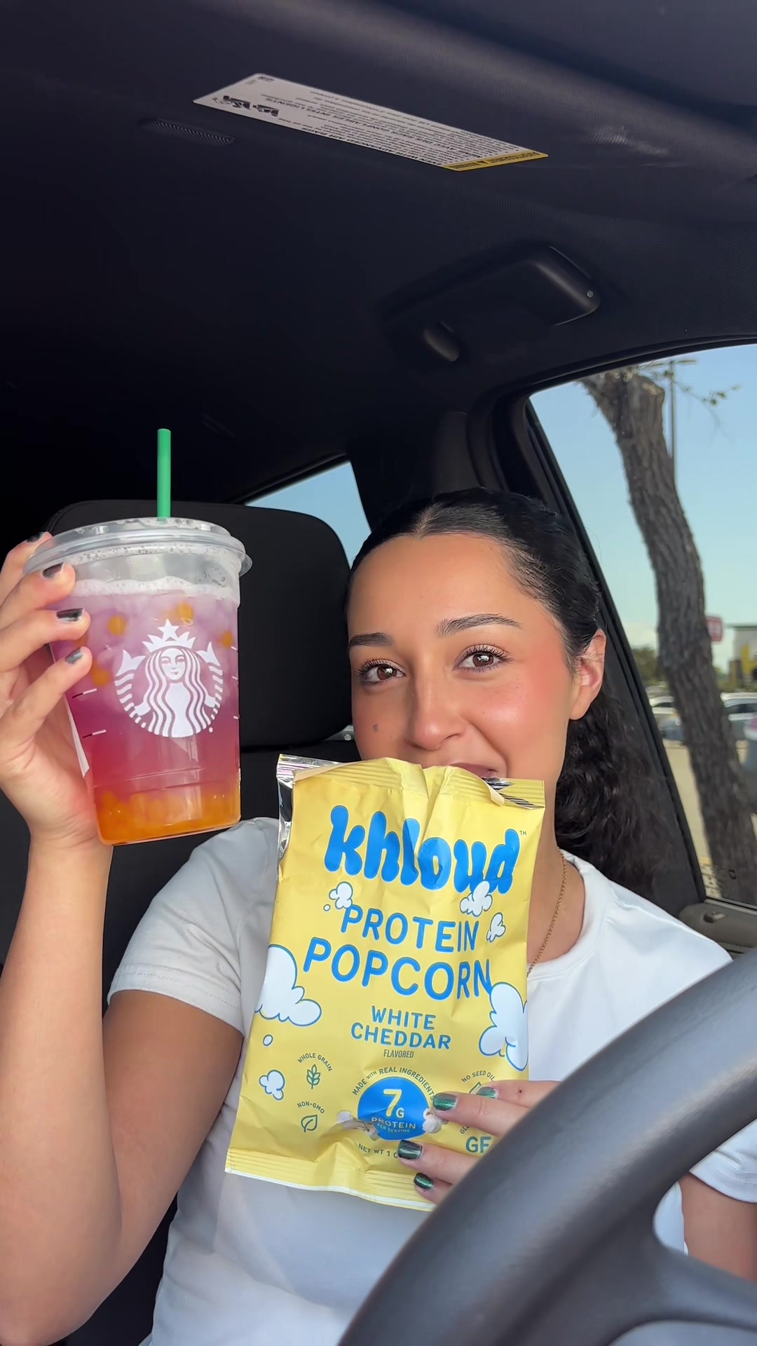 TikTok post by @emiliyvasquez01 for Khloud. Caption reads: Have you tried them yet?🍿🥤 @KhloudFoods #khloud....