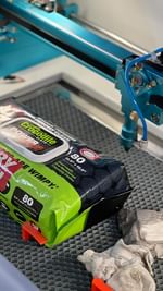 Instagram post by @gingerwoodworks for Crocodile Cloth. Caption reads: In the laser world, maintenance is everything. ....