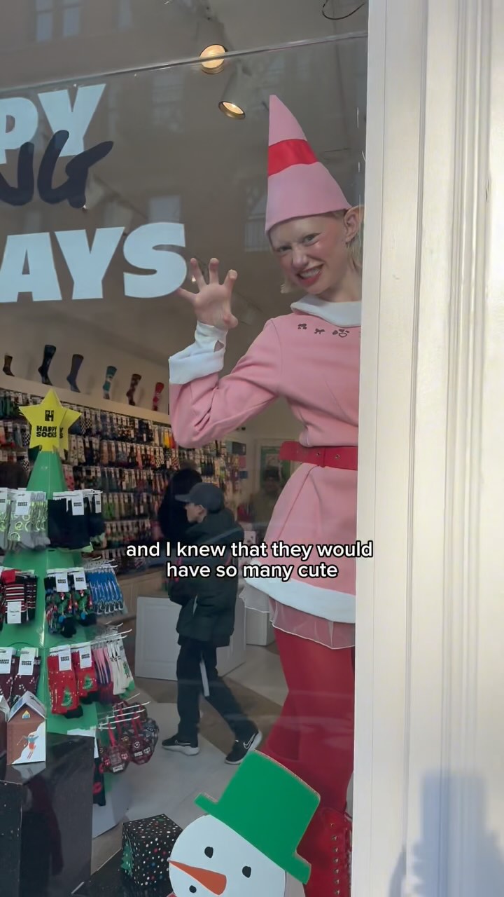 Instagram post by @kittylever for Happy Socks. Caption reads: dressed up as an elf and went to....