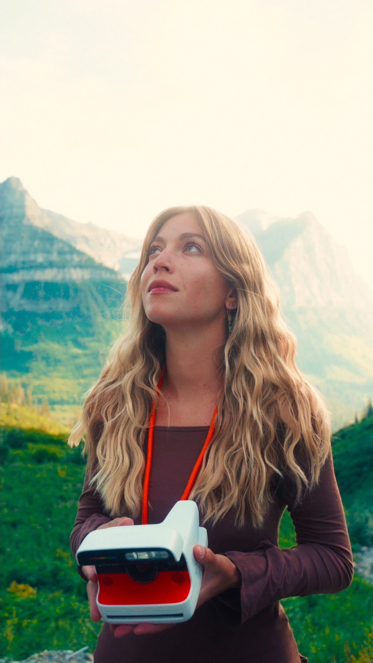 Instagram post by @sunnrayy for Polaroid. Caption reads: Time goes by fast, but I pause time with my....