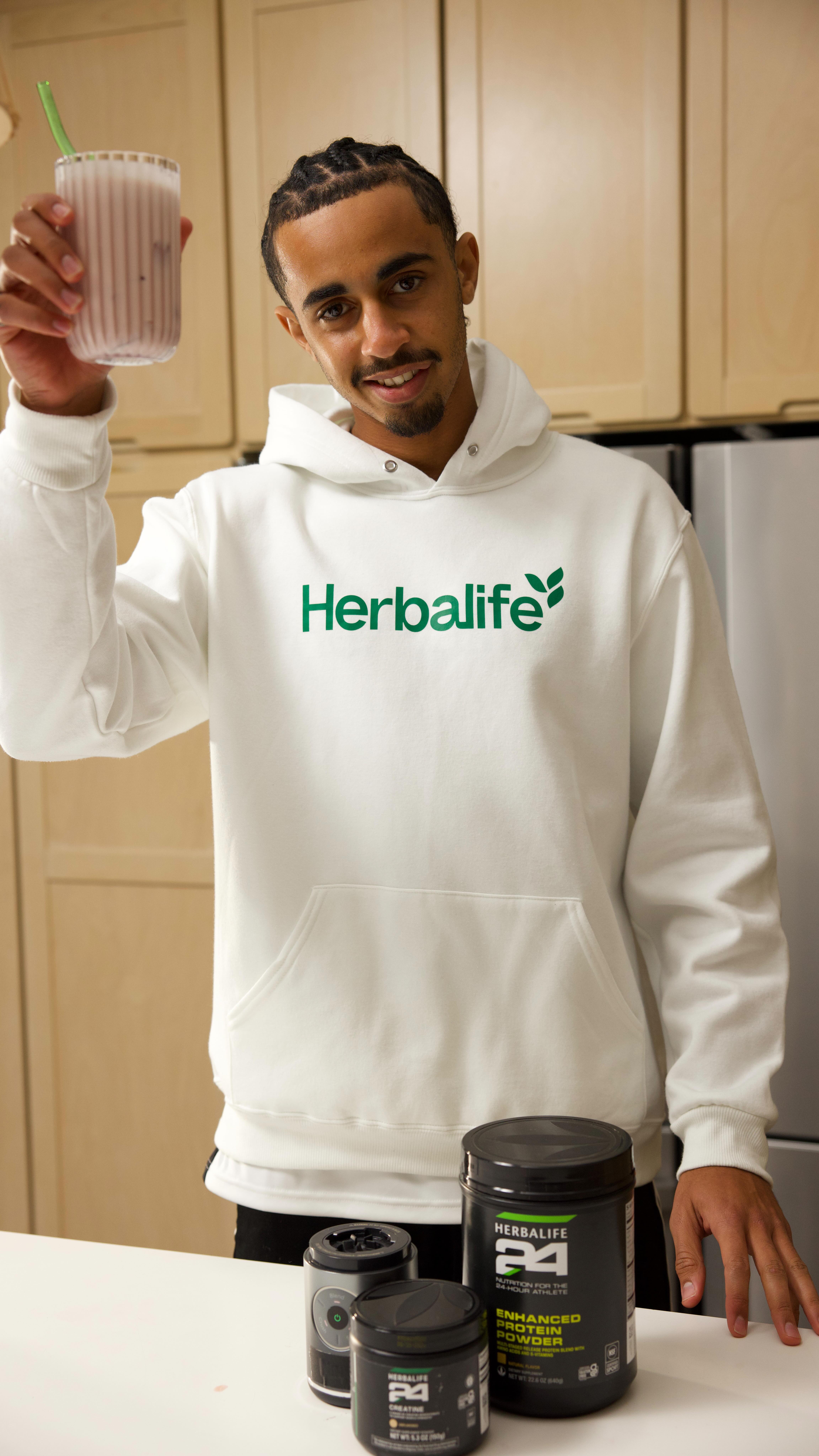 Instagram post by @jalenneal_ for Herbalife. Caption reads: Recovery never tasted this good. 🍒

I mix....