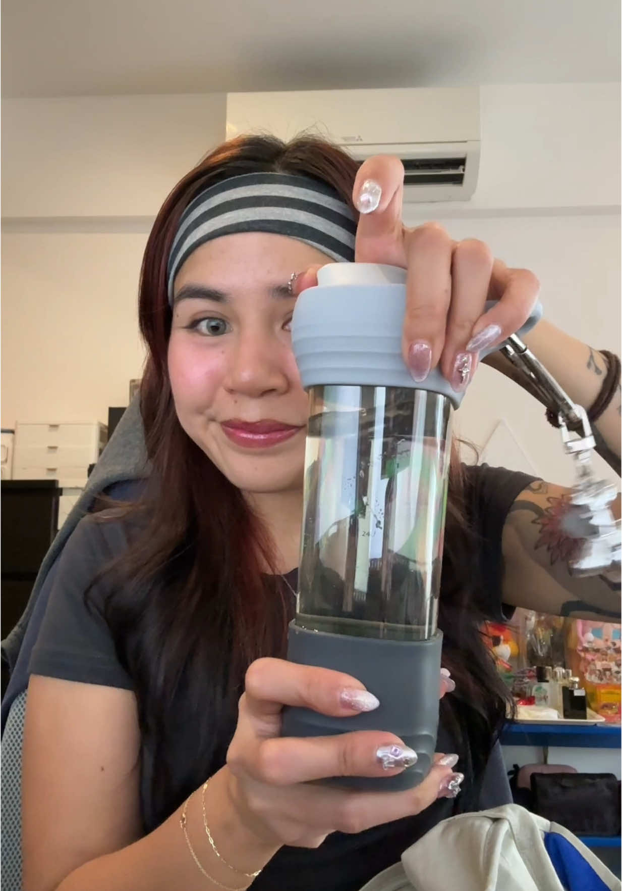 TikTok post by @mizchiefmagikk for Hegen. Caption reads: featuring my new travel essential the @Hegen....