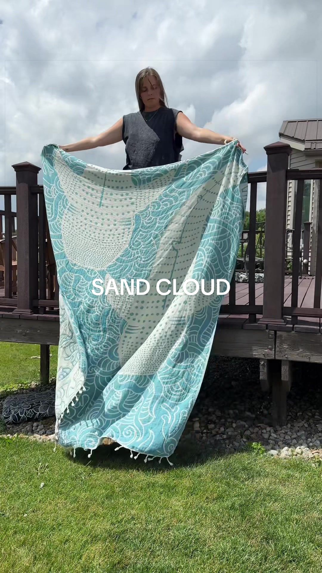 TikTok post by @thehannaco for Sand Cloud. Caption reads: #dealsforyoudays #sandcloud @Sand Cloud.