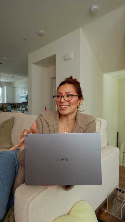 Instagram post by @juliageezy for Intel. Caption reads: [...] starting at $599 for students 🫶🏽 @dell....