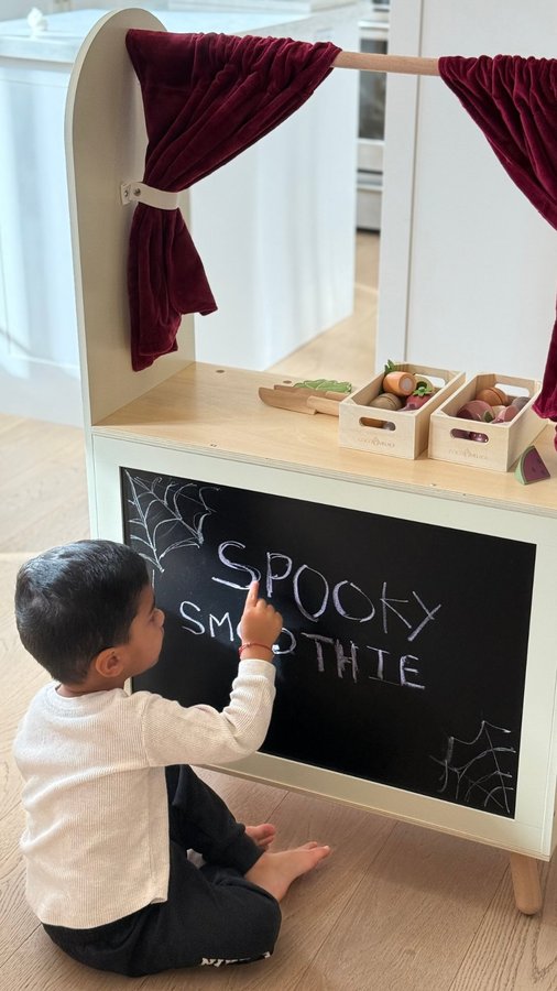 Instagram post by @canadian.mom.life for Coco Village. Caption reads: He’s been watching Dad make smoothies every....