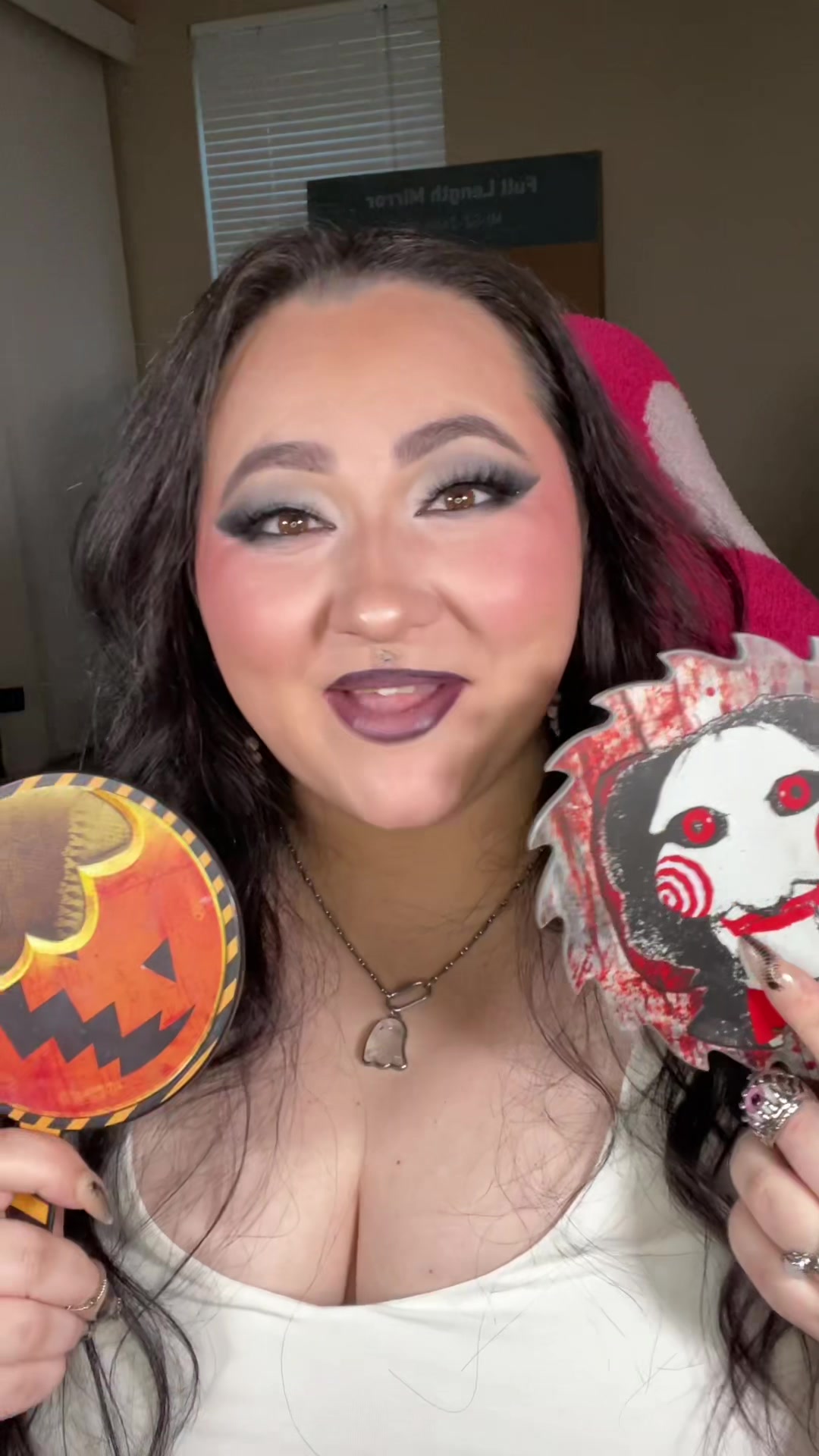 TikTok post by @beedubbz11 for Glamlite Cosmetics. Caption reads: @Glamlite just be taking me money 😝 🖤🔪💀....