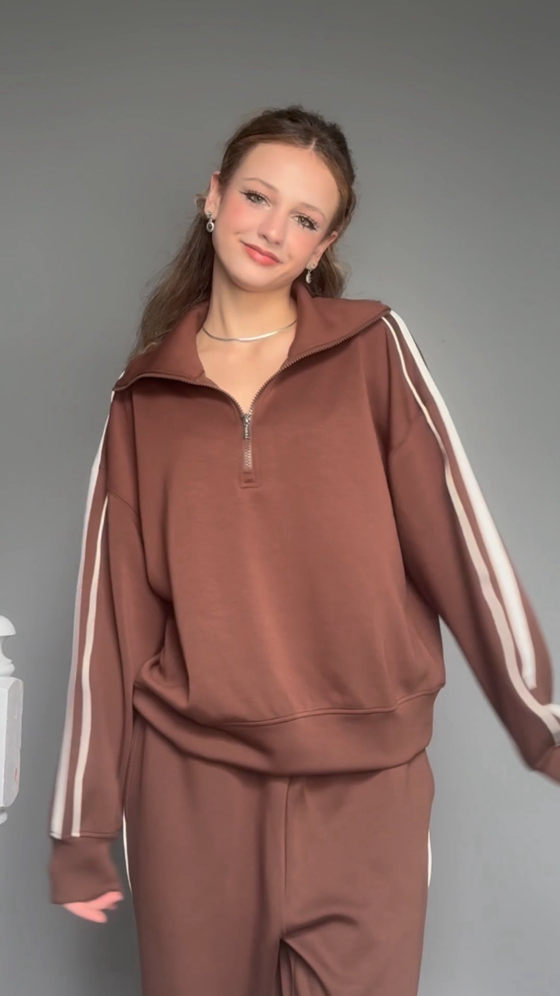 Instagram post by @ava_rivello_official for MOOSLOVER. Caption reads: me: i’ll just wear something chill today 🤎
also....