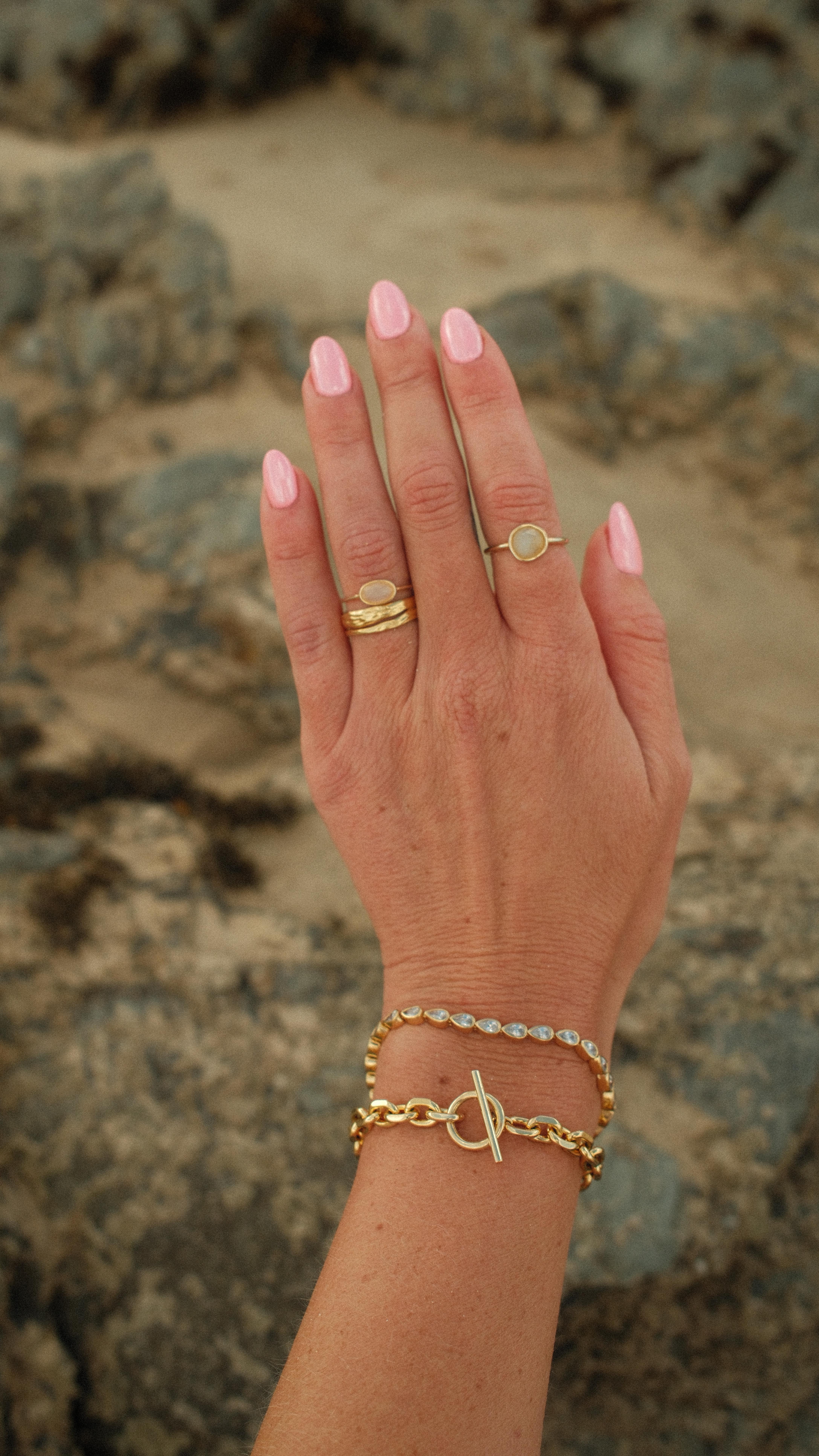 Instagram post by @steph__andr for Jewells. Caption reads: An arm full of jewels from @jewellsofficial....