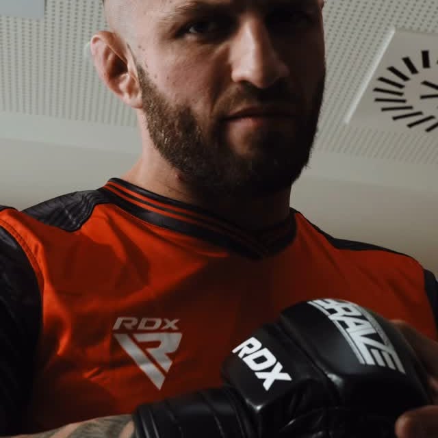 Instagram post by @shahk01 for RDX Sports. Caption reads: Made for the fight game 👊🏻 Your #BRAVECF96 x....