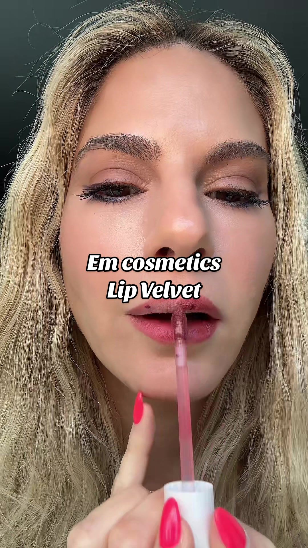 TikTok post by @kellykrugerbrooks for EM Cosmetics. Caption reads: [...] You will be obsessed with these!!! @EM....