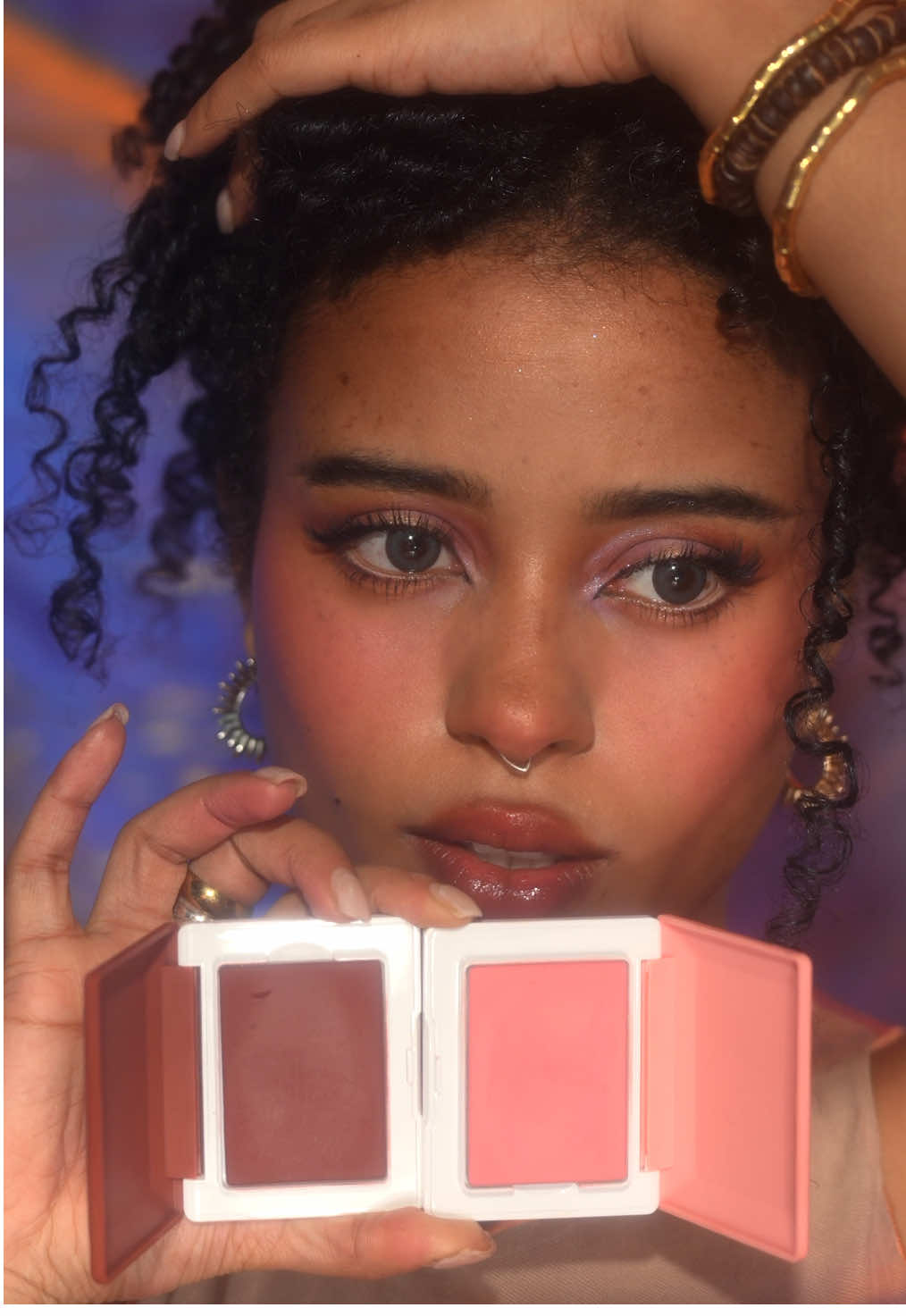 TikTok post by @kali.ledger for Glossier. Caption reads: Thank you @Glossier for making me a....