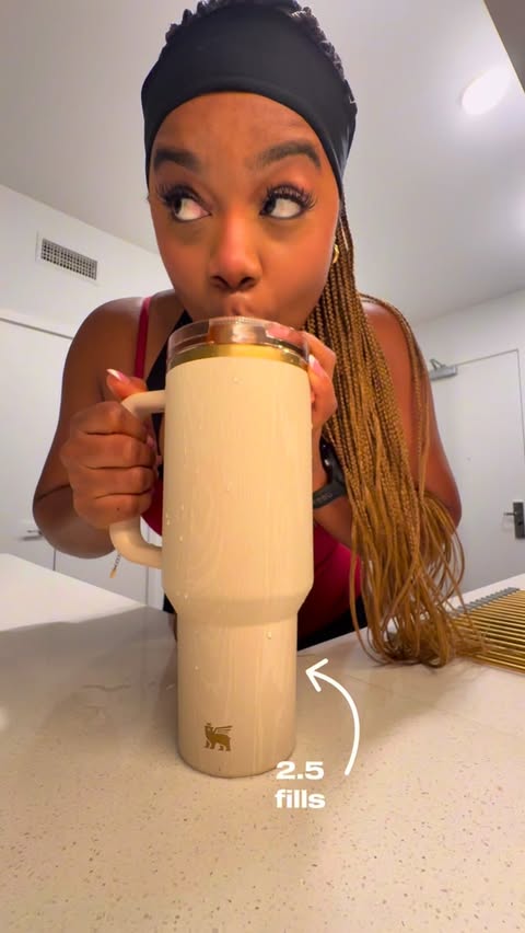 Instagram post by @oreyfit for Stanley 1913. Caption reads: staying hydrated this holiday season with my new....