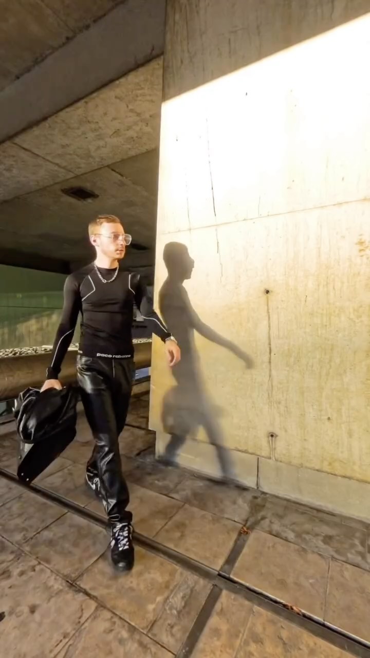 Instagram post by @tonygrieco for Daniel Wellington. Caption reads: Concrete calm, frozen light, time stands still 🕰️....