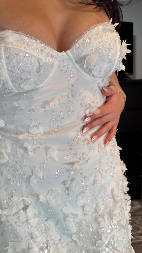 Instagram post by @bridetobe.boulevard for OH POLLY. Caption reads: [...] most perfect bridal shower mini dress💍....