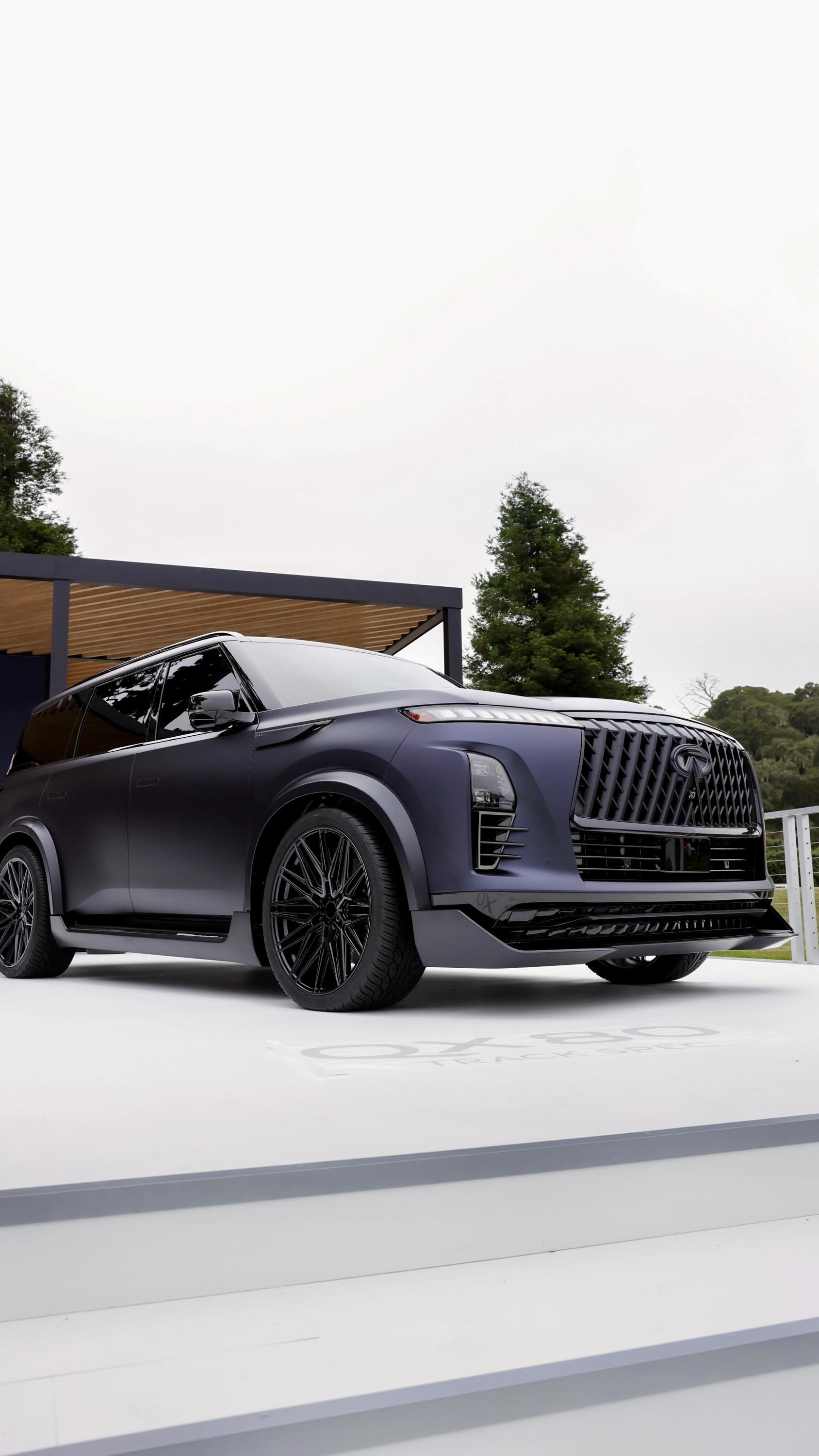 Instagram post by @nvzion for INFINITI USA. Caption reads: The INFINITI QX80 Track and Terrain Spec concepts....
