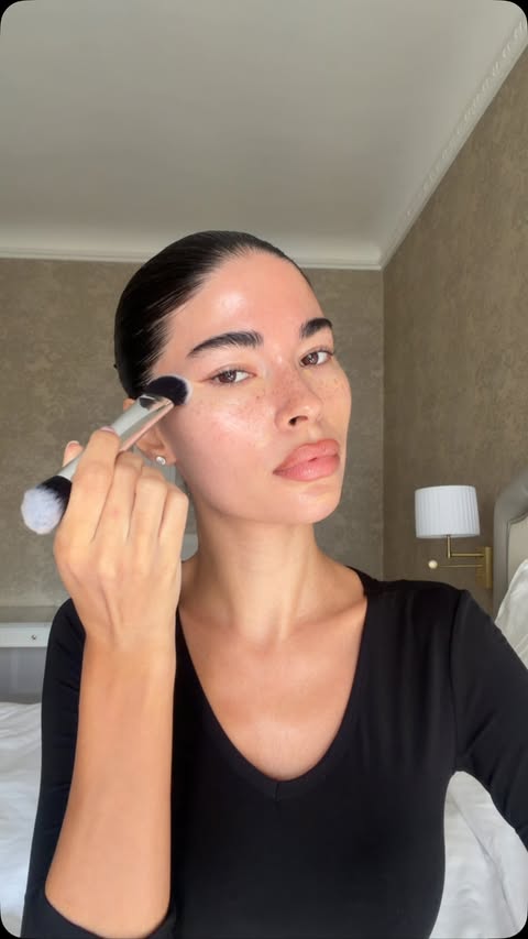 Instagram post by @aishapotter for Haus Labs by Lady Gaga. Caption reads: watch me use my fave brush for my whole face....