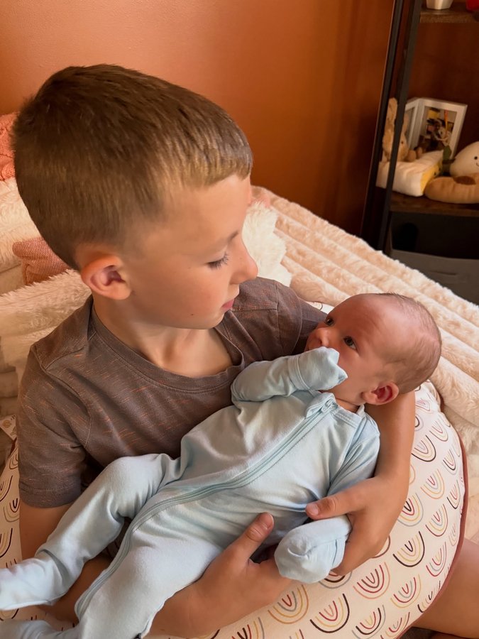 Instagram post by @allisynmichelle for Kyte Baby. Caption reads: 1 month and lots of love. I also just realized....