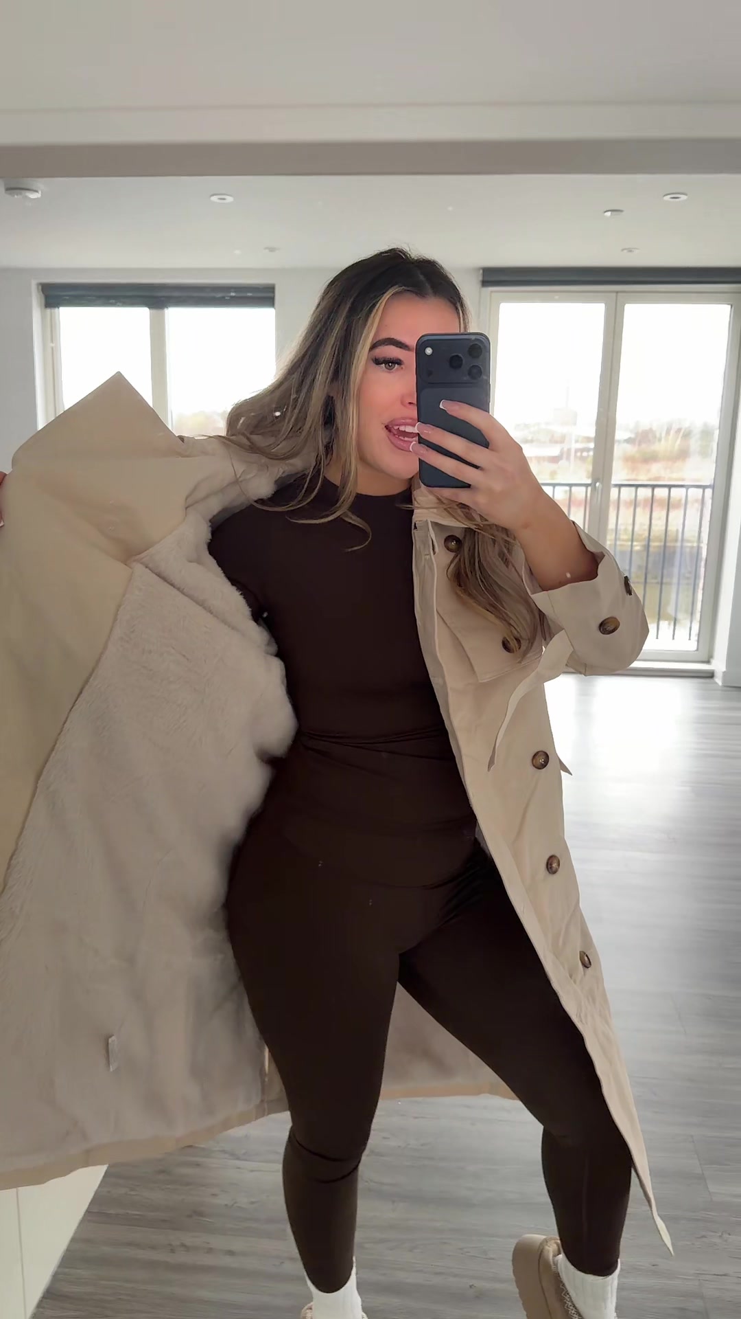 TikTok post by @annabelkershaw for KATCH ME. Caption reads: Fleece lined trench coat from @Katch Me #katchme....