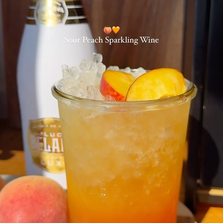 Instagram post by @mascocina05 for Luc Belaire. Caption reads: Sour Peach Sparkling Wine 🍑🍹

Thank you to....